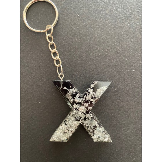 Porte-clé lettre "X" noir / feuilles argentées